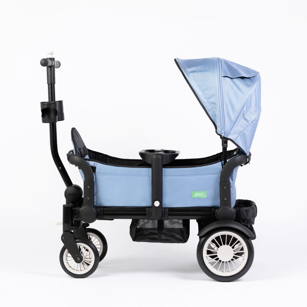 Seaside Blue stroller wagon for babies, perfect for family outings and outdoor adventures.