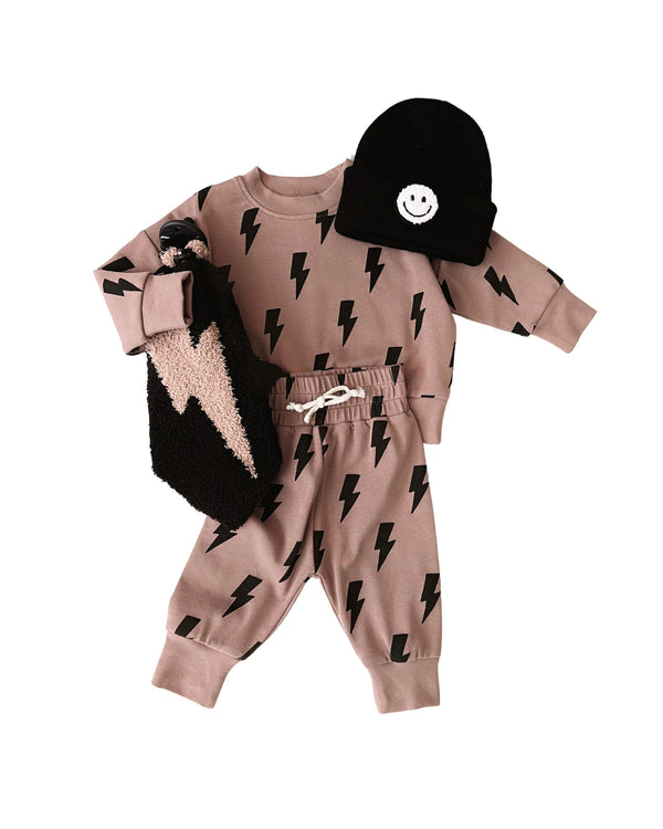 Mocha Bolts baby jogger set in lounge style, angled view showcasing comfort and style for little ones.