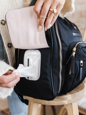 Black satchel diaper bag at angle 12, stylish and functional for parents on the go.