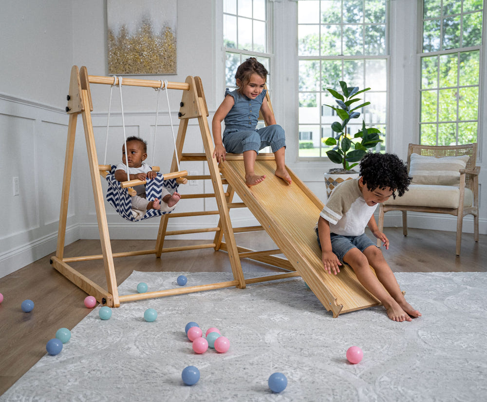 Juniper foldable toddler climber and swing for indoor play, promoting active fun and safe exploration.