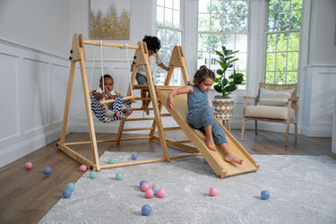 Juniper foldable toddler climber and swing for indoor play, promoting active fun and safe exploration.