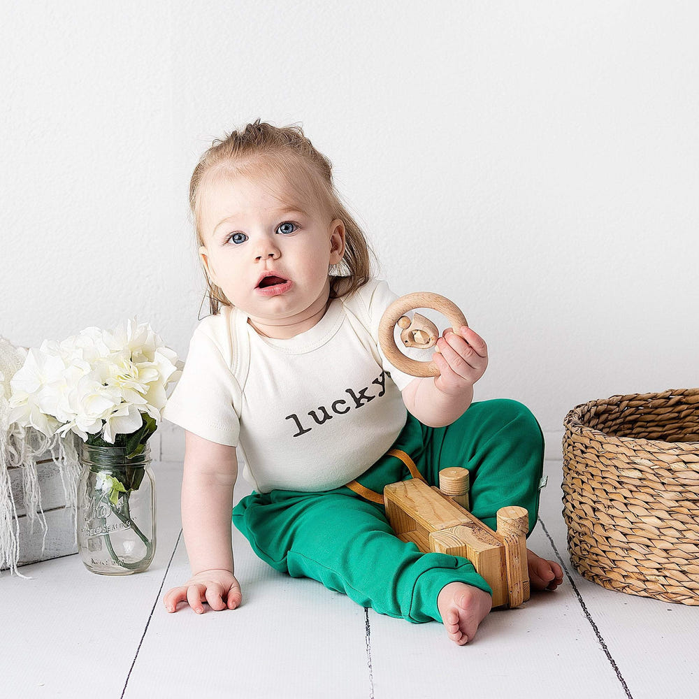 "Graphic lucky bodysuit for babies - short sleeve, cute and comfortable design."