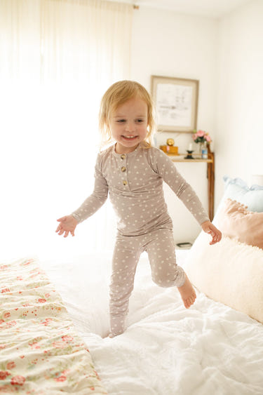 Oopsie Daisy 2pc Henley Bamboo Pajamas for babies, perfect for sleep, available in newborn sizes and up.