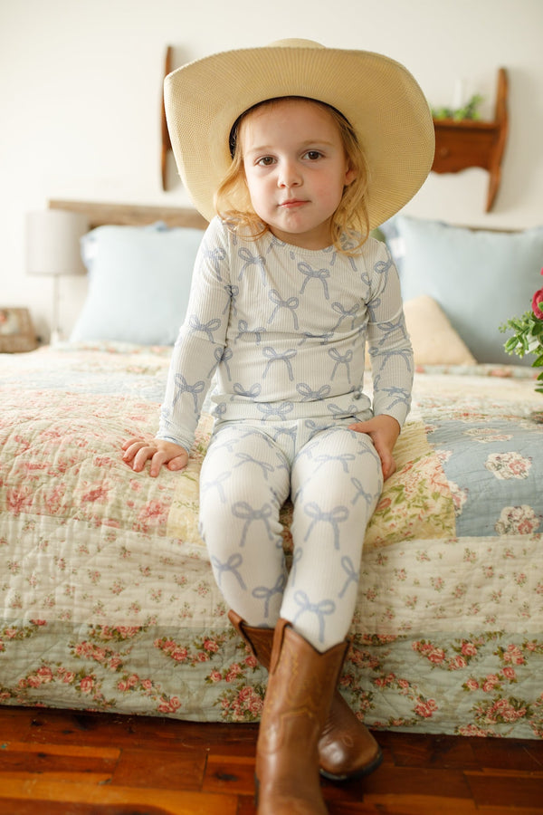 Blue Belle 2pc Ribbed Bamboo Pajamas for babies, cozy and stylish sleepsuit in soft blue, angle view.