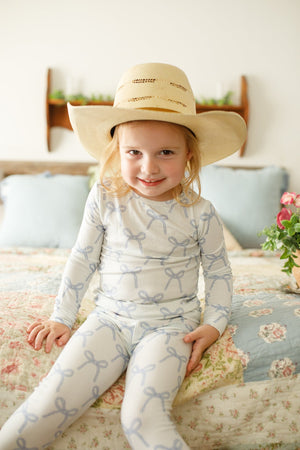 Blue Belle 2pc ribbed bamboo pajamas for babies, featuring a cozy design in soft blue, angle view.