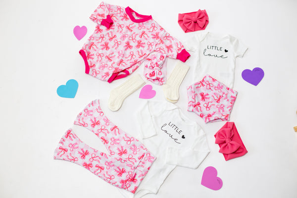 Little Love pink bows Valentine's Day bell bottom outfit for babies, stylish two-piece set at angle 8.