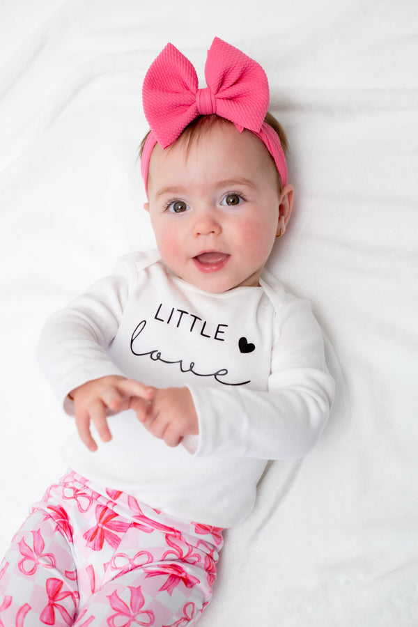 Little Love Pink Bows Valentine's Day bell bottom outfit for babies, featuring a stylish two-piece set.