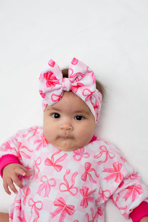 Pink Bows Bubble Romper for babies, showcasing a cute design from angle 5. Perfect for stylish playtime outfits.