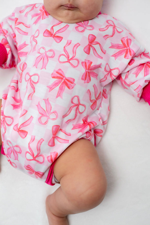 Pink Bows Bubble Romper for babies, featuring a cute design and comfortable fit, angle view 6.