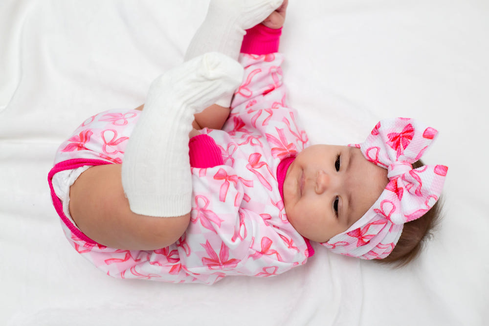 Pink Bows Headwrap Bow for babies, stylish and comfortable accessory in a soft fabric. Perfect for any outfit.