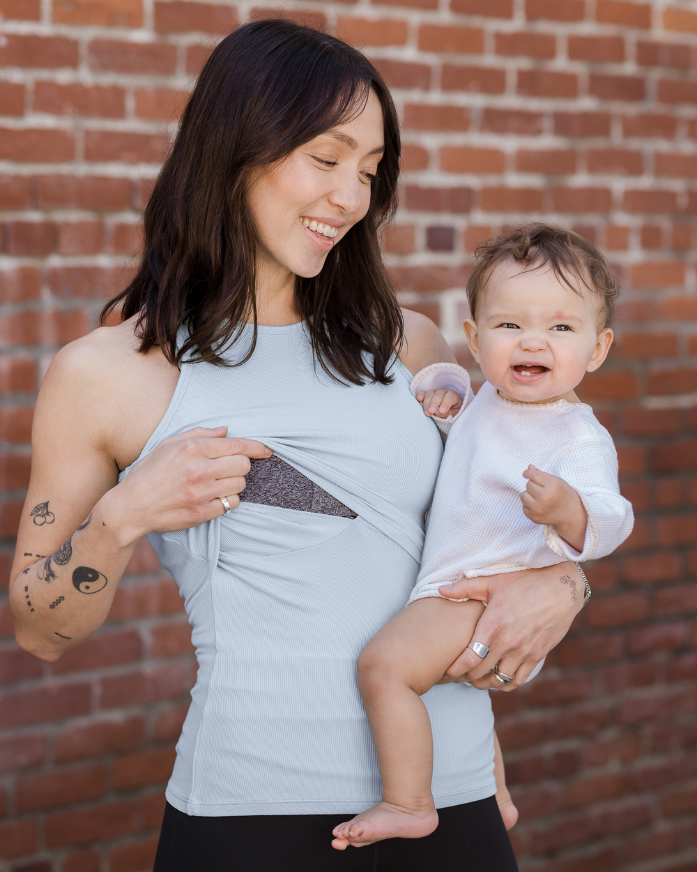 Ribbed bamboo racerback nursing tank in French blue for comfortable breastfeeding. Perfect for new moms.