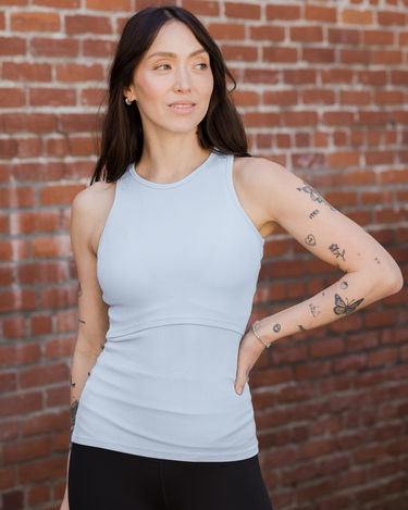 Ribbed bamboo racerback nursing tank in French blue for comfortable breastfeeding. Perfect for new moms.
