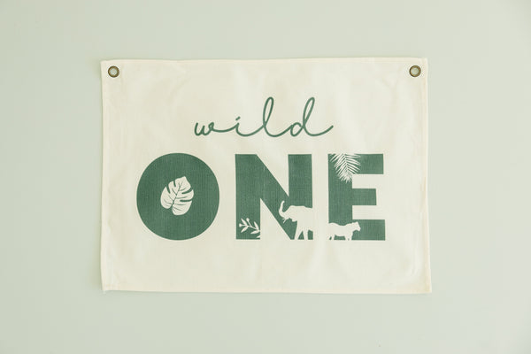 Wild One First Birthday Jungle Theme Canvas Banner - Colorful wall art for celebrating a baby's first birthday.