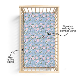 Lillian Floral Bamboo Crib Sheet in angle view, featuring a delicate floral pattern for a stylish nursery.