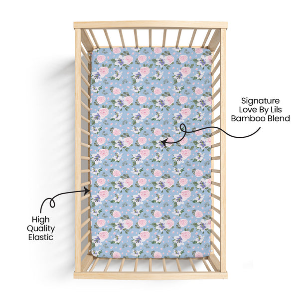 Lillian Floral Bamboo Crib Sheet in angle view, featuring a delicate floral pattern for a stylish nursery.