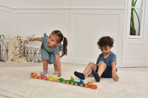 Wooden car toy set - 10 piece indoor playset for babies, shown from angle 8.
