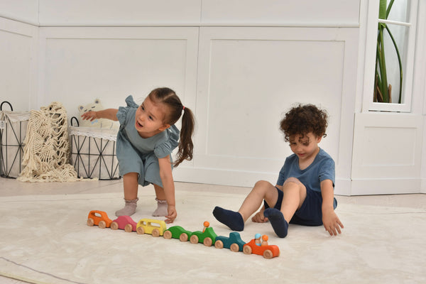 Wooden car toy set - 10 piece indoor playset for babies, shown from angle 8.
