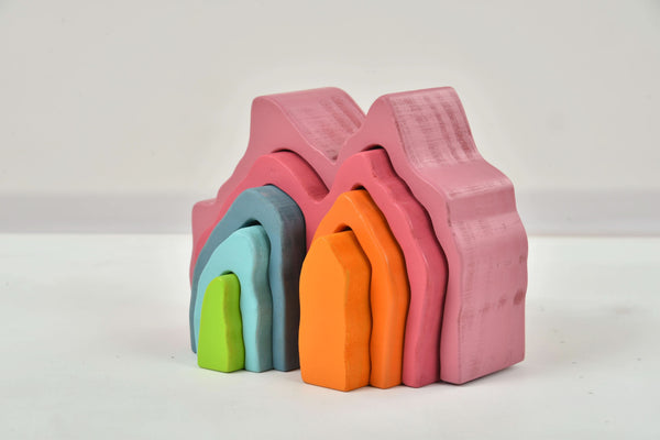 Wooden Mountain Rainbow Stacker Toy Puzzle Blocks for indoor play, promoting creativity and fine motor skills in babies.