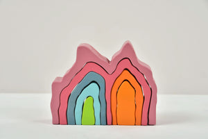 Wooden Mountain Rainbow Stacker Toy Puzzle Blocks in vibrant colors, perfect for indoor play and early childhood development.