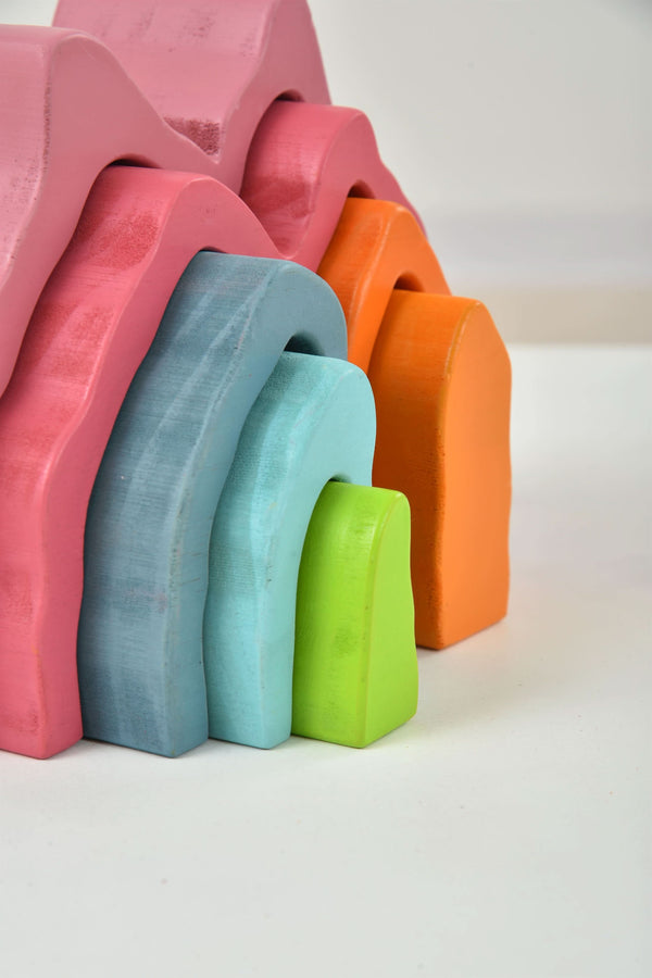 Colorful wooden mountain rainbow stacker toy puzzle blocks for indoor play, showcasing angle 7 view.
