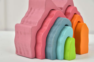 Colorful wooden mountain rainbow stacker toy puzzle blocks for indoor play, viewed from angle 9.