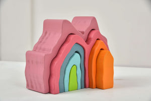 Wooden Mountain Rainbow Stacker Toy Puzzle Blocks in vibrant colors, perfect for indoor play and early development.