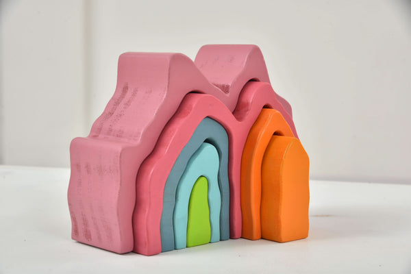 Wooden Mountain Rainbow Stacker Toy Puzzle Blocks in vibrant colors, perfect for indoor play and early development.