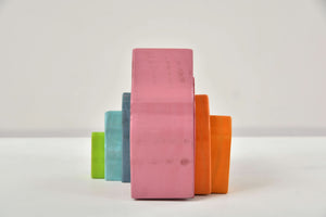 Wooden Mountain Rainbow Stacker Toy Puzzle Blocks in vibrant colors, perfect for indoor play and early learning.