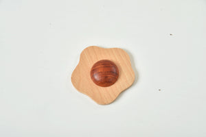 Wooden play food sets for kids' kitchen, showcasing colorful pieces from a side angle. Perfect for imaginative play!