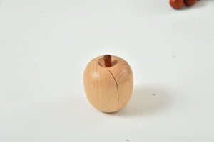 Wooden play food sets for kids' kitchen, showcasing colorful pieces from an angled view. Perfect for imaginative play!