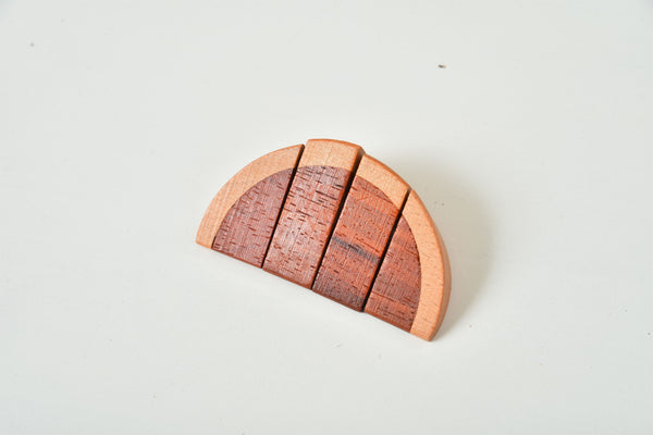 Wooden play food sets for kids' kitchen, showcasing colorful, durable pieces for imaginative indoor play.