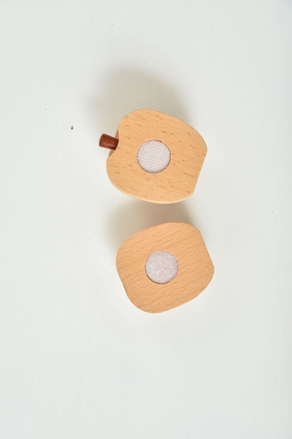 Wooden play food sets for kids' kitchen, showcasing colorful pieces at a 15-degree angle.