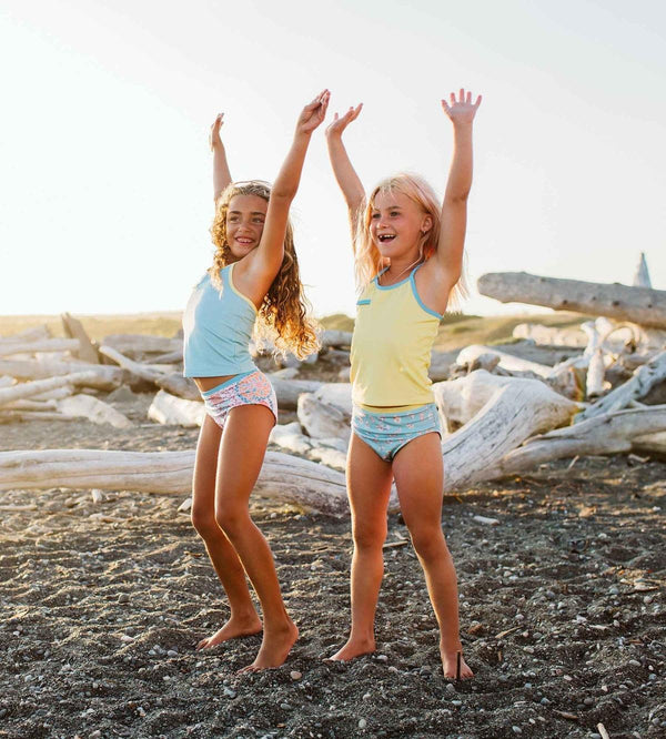 Simone Tankini Set in Coral - Stylish two-piece swimwear for babies, shown from angle 3.