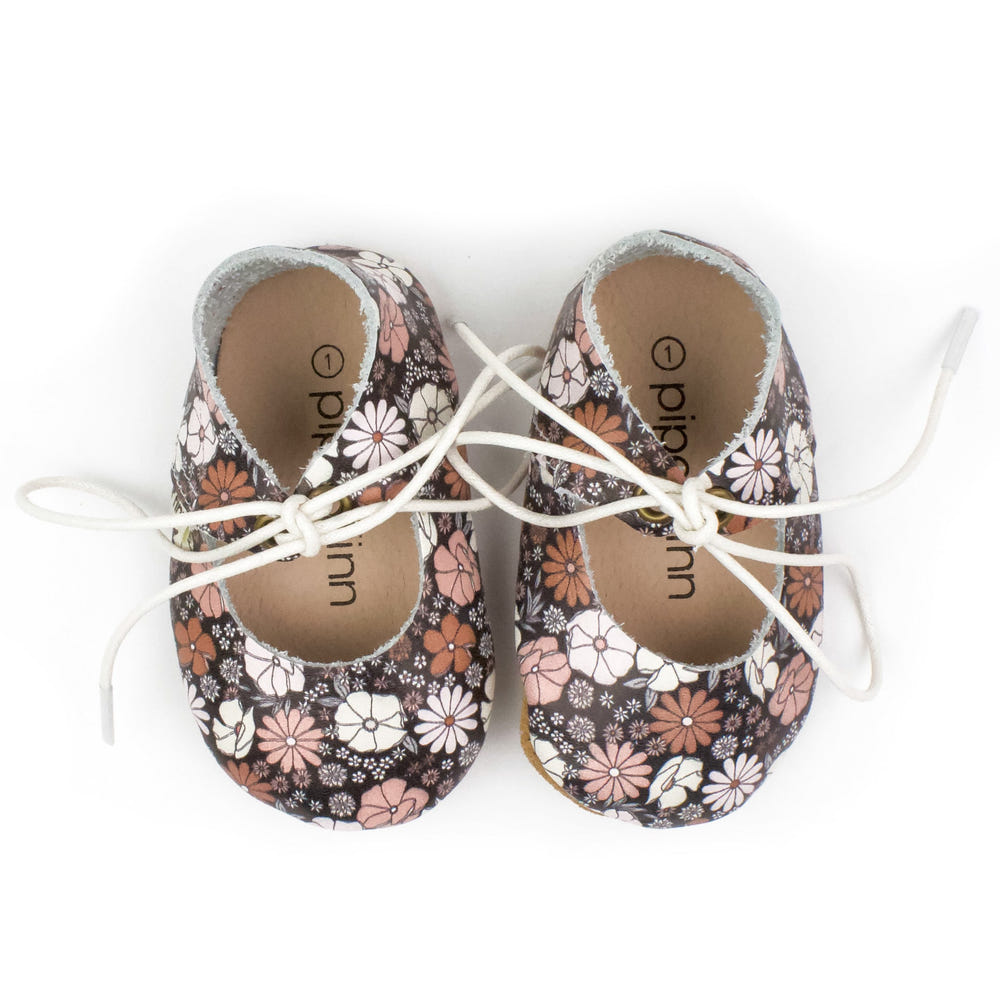 Black Floral Lace-Up Mary Jane Soft Sole for babies - stylish and comfortable footwear for little ones.