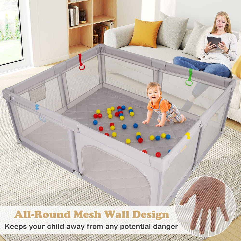 Large gray baby playpen with pull rings and ocean balls, perfect for safe playtime and feeding.