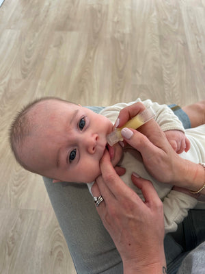Haakaa 4ml Silicone Colostrum Collectors, 2-pack, pre-sterilized for breastfeeding convenience.