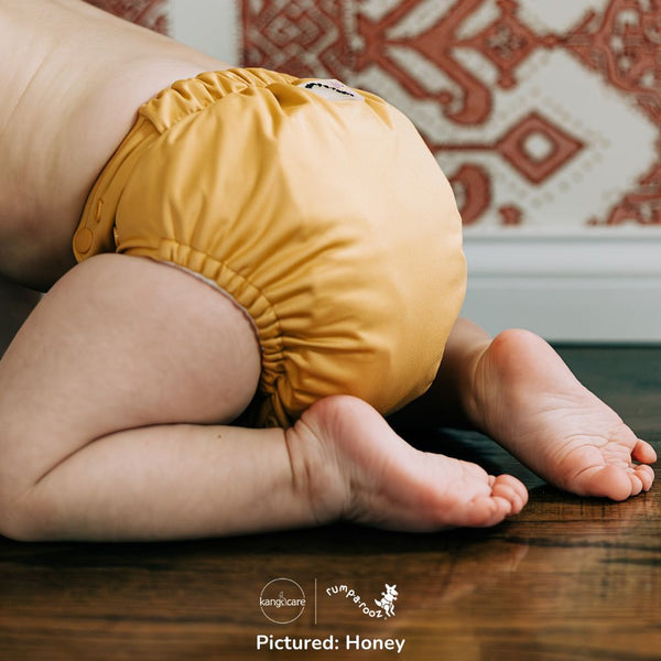 Rumparooz OBV G3 One Size Pocket Cloth Diaper in Atlantis Teal, angled view, perfect for baby bedding and sleep.