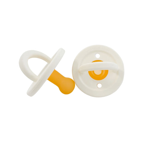 Modern coconut milk pacifier for babies, designed for comfort and style.