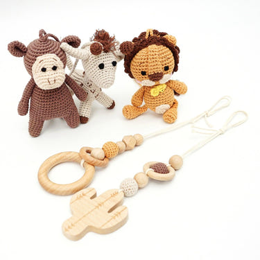 Handmade crochet toys for baby gym featuring Savanna Friends, perfect for stimulating play and development.
