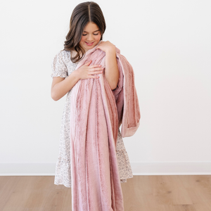 Lush toddler blankets in soft fabric, perfect for cozying up and swaddling your little one.
