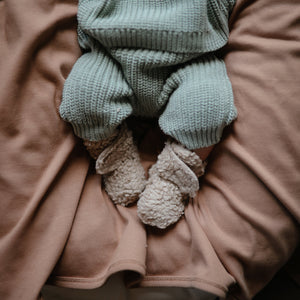 Chunky knit pants for babies in a cozy angle 12 view, perfect for comfort and style.