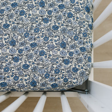 Bluebell Pointelle Bamboo Stretch Crib Sheet in soft blue, perfect for baby bedding and linens.