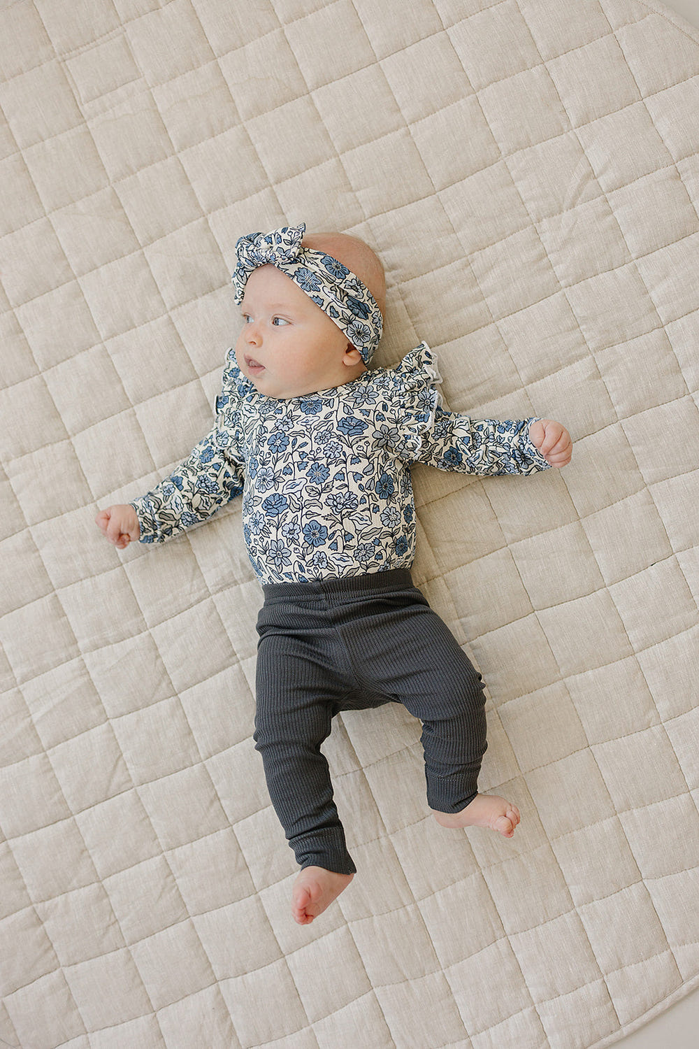 Bluebell Ruffle Sleeve Pointelle Bamboo Bodysuit for babies - soft, stylish long sleeve outfit.