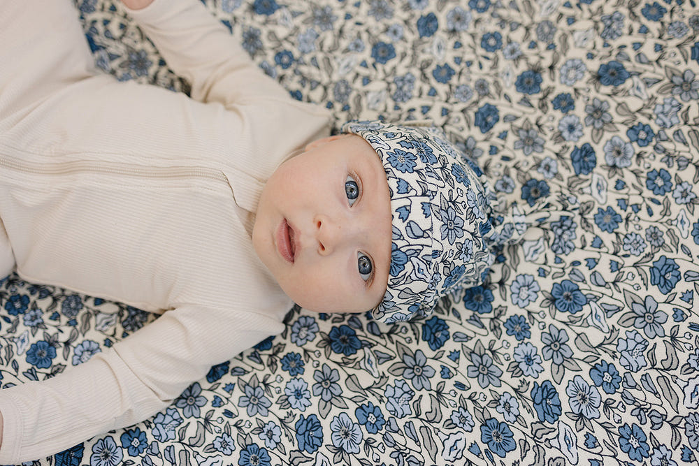 Bluebell Pointelle Bamboo Newborn Knot Hat in soft blue, perfect for keeping little heads warm and stylish.