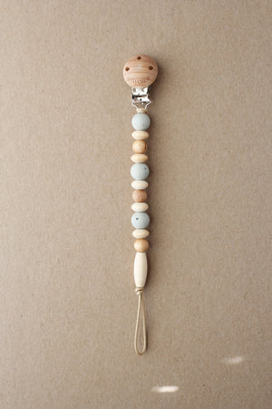 Speckled Soft Sage Pacifier Clip - Omar, perfect for keeping pacifiers clean and accessible for your baby.