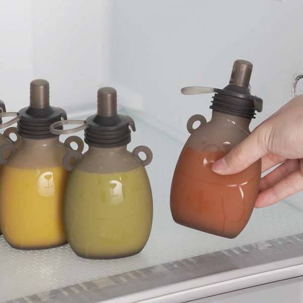 Haakaa Happii Bear Silicone Goody Pouch 6 oz for easy feeding and storage, shown at angle 9.