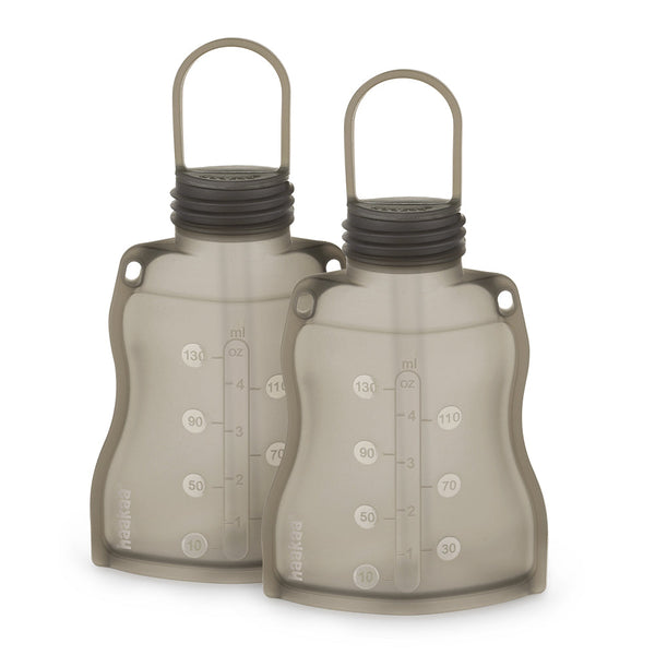 Haakaa Silicone Leakproof Stopper for bottles, angle 3 view, perfect baby bottle accessory for mess-free feeding.