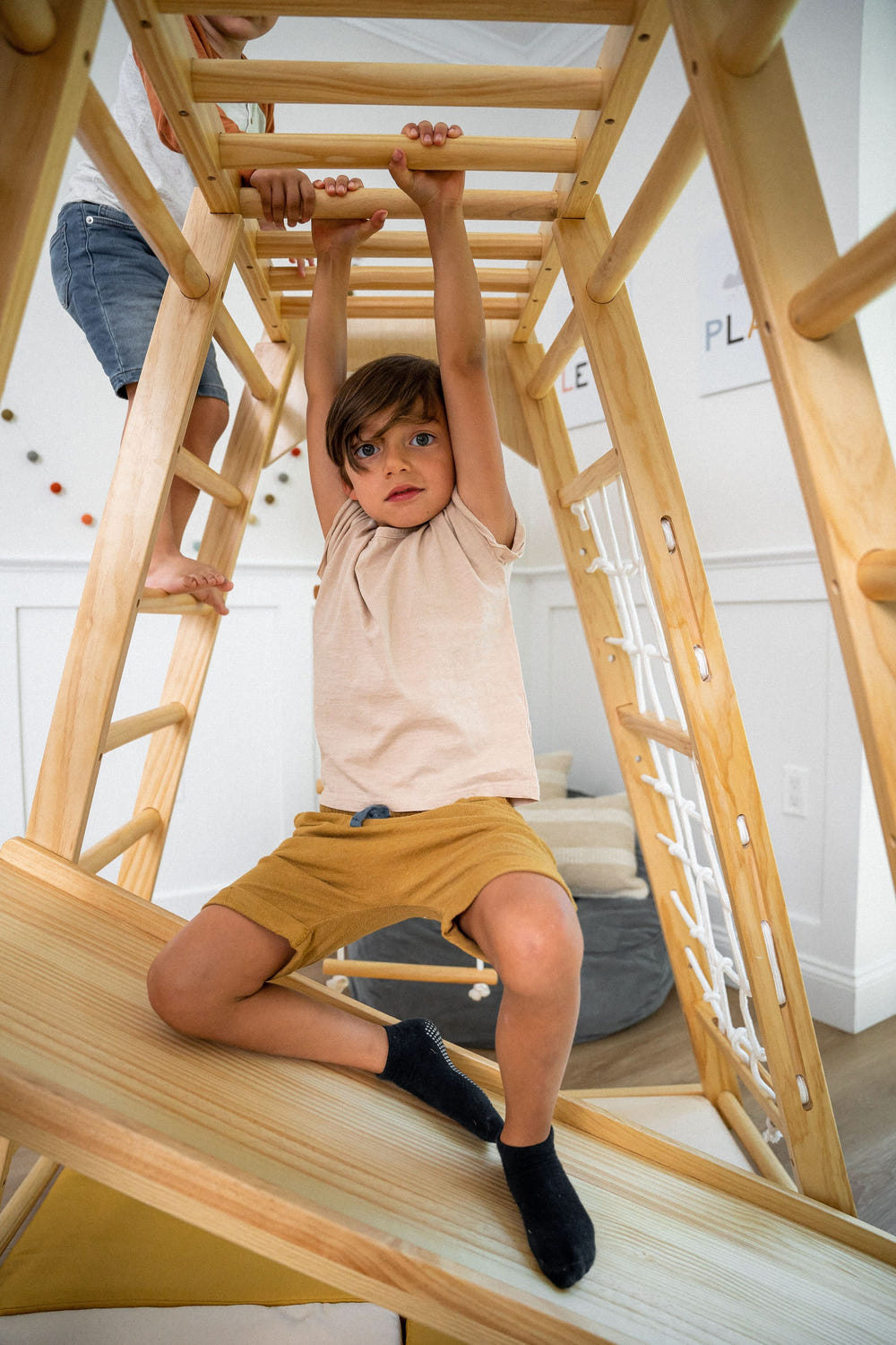 Magnolia Jungle Gym: Stylish indoor playset for babies, promoting fun and safe exploration in a vibrant jungle theme.