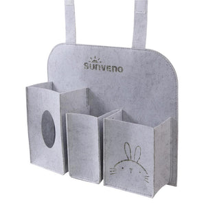 Baby car seat hanging organizer for travel essentials, featuring multiple pockets for easy access and storage.