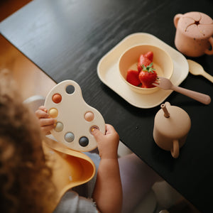 Colorful Paint Palette Press Toy for babies, promoting sensory play and creativity. Angle 7 view.